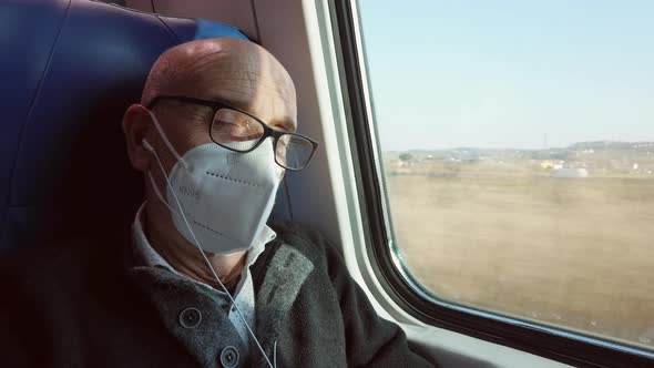 Old Man Sleeping on the Train