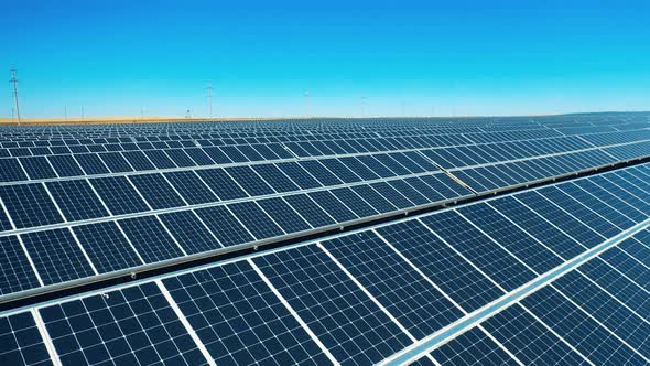 Drone Shot of Solar Panel Rows at a Solar Power Facility