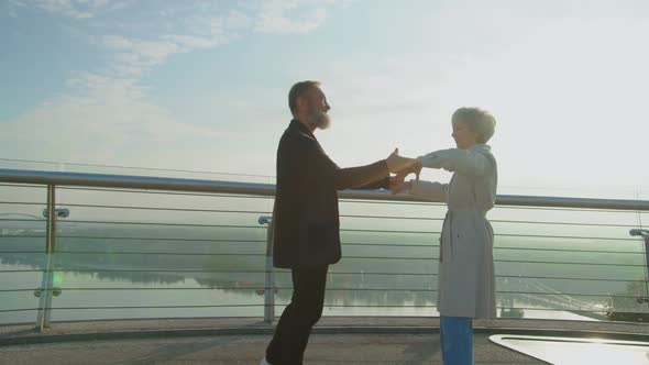 Closeup of Mature Husband Dancing with His Elegant Senior Wife