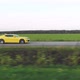 Yellow Sports Car Moving on the Country Road - VideoHive Item for Sale