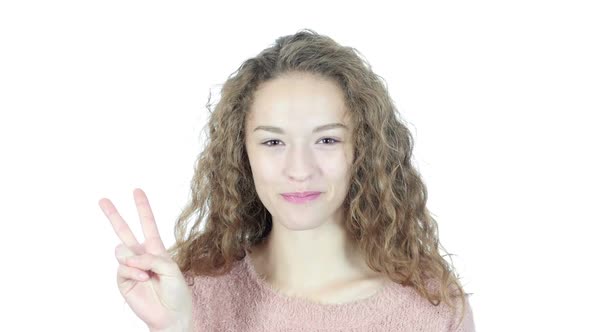 Portrait OF  Beautiful Woman Showing Victory Sign