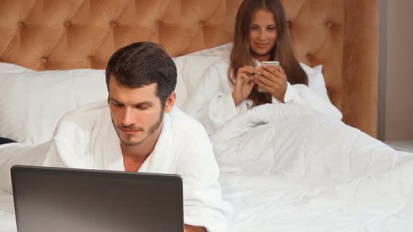 Handsome Man Working on His Laptop at the Hotel Room 1080p