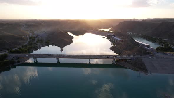 Sunset with a View of the Dam and Bridge