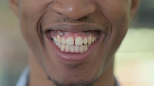 Close Up of Face of Smiling African Man 