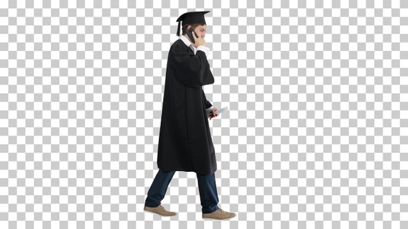 Smiling male student in graduation robe, Alpha Channel