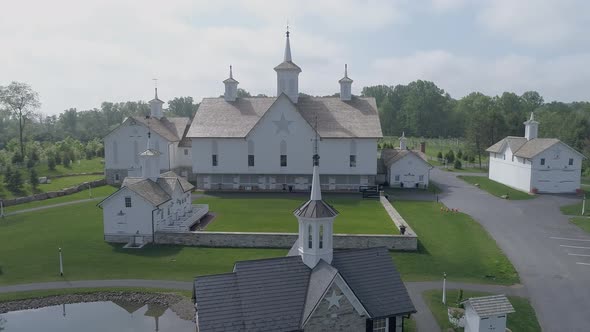 Aerial View of Old Restored Barns on a Spring Day