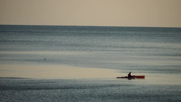 Sunset Kayaking on the Sea