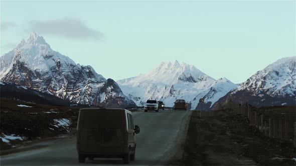 Road to Ushuaia city with Snow Covered Mountain Background, Tierra del Fuego, Argentina.