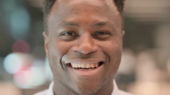 Close Up of African Businessman Smiling at the Camera