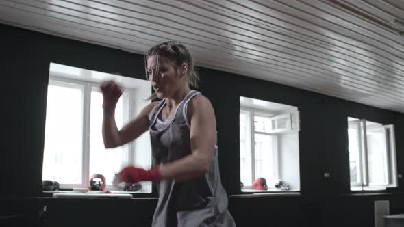 Fit Woman Doing Kickboxing Workout