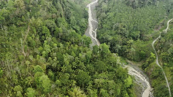 Drone Flight Tilting Up Shot Of Tumpak Sewu Waterfalls