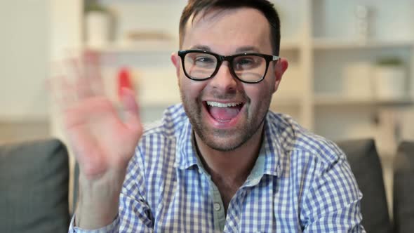 Portrait of Online Video Chat By Happy Young Man 