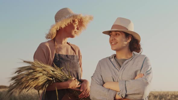 Portrait of Two Diverse Women in Wheat Filed