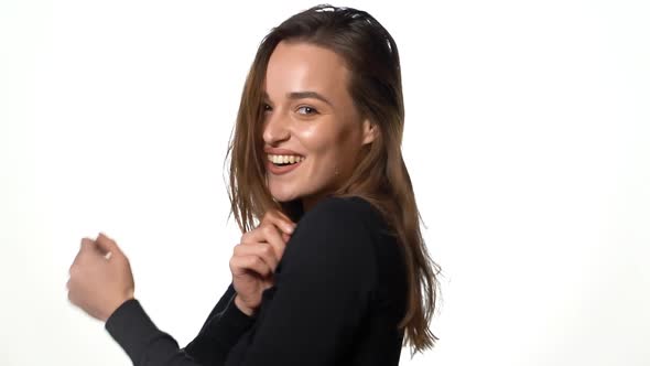 Shot of female model. Portrait of friendly woman smiling on isolated white background