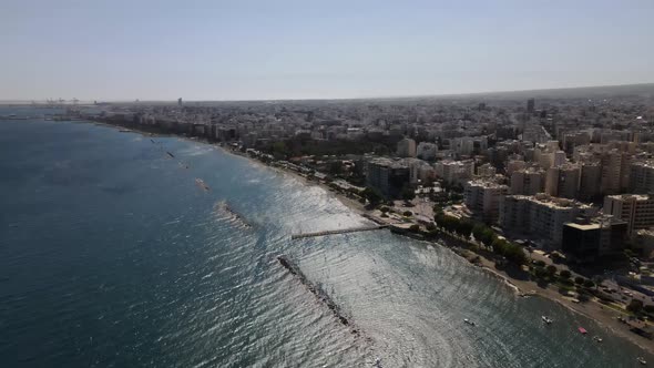 Embankment of Limassol in Cyprus. Modern architecture and old town. Skyscrapers.