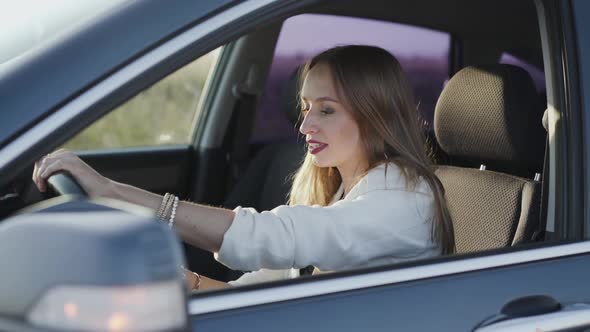 Desperate Woman Can't Start Auto and Smiles