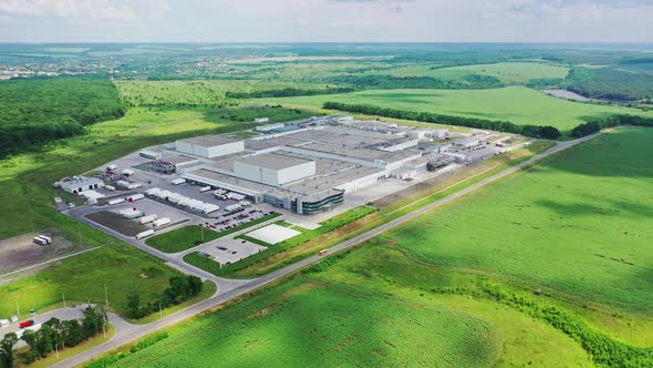 High above industrial factory. Aerial view of large factory and industrial complex