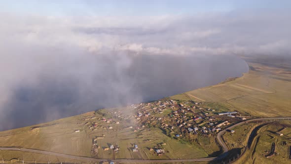 Aerial hyperlapse of Lake Paravani and the village Poka. Georgia 2021