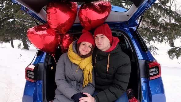 Girl Puts Her Head on the Guy's Shoulder