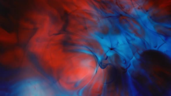 Colorful patterns moving around in liquid