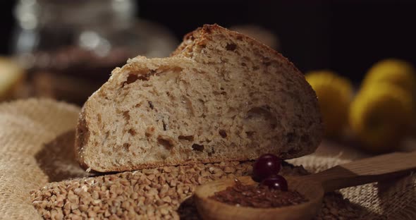 Fresh Slice Of Buckwheat Bread With Flax Seeds On The Table