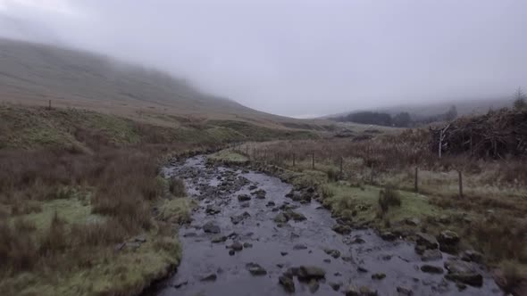 Aerial view of countryside road in Wales on a cloudy day