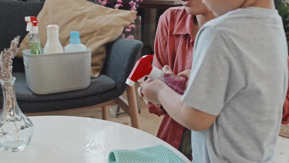 Asian Mom and Son Doing Cleaning at Home