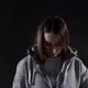 Determined woman zips up hoodie to go running in cold weather - VideoHive Item for Sale