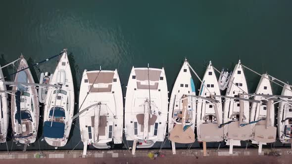 Aerial View on Moored White Sailing Boats at Lipari Islands. Sicily, Italy. Pier of Touristic Port