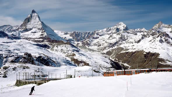 Train Passing By the Matterhorn Mountain in Zermatt