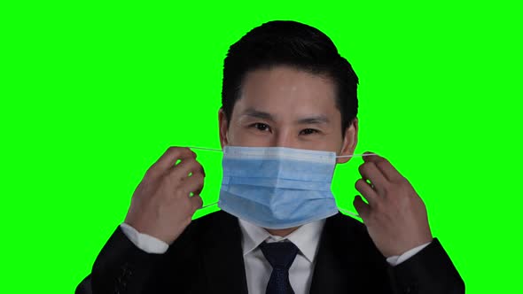 Business man wearing protective mask