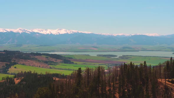 Liptov Region of Slovakia with a Lake and Snowy Low Tatra Mountains Range