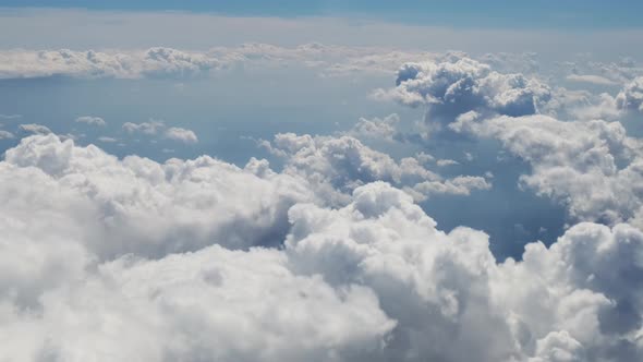 Clouds View From the Plane the Plane Flies High in the Sky Above the Clouds