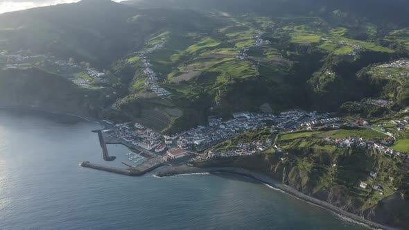 Aerial View of town with port on the ocean, Azores, Portugal.