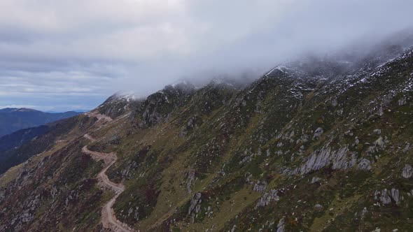 Curve of Serpentine Road in Mountain at Morning