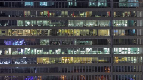 Windows of Office Buildings at Night Timelapse the Light From the Windows of Houses