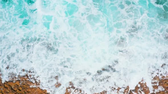 Flight over Stony Beach and Waves