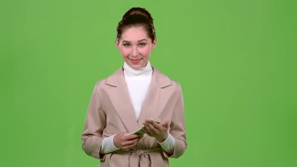 Girl Won the Jackpot in the Lottery. Green Screen. Slow Motion
