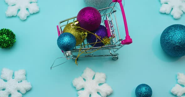 Stop Motion Animation New Year, Toys For The Christmas Tree In A Basket From A Supermarket. alt