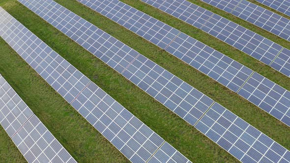 A solar farm in Staffordshire, thousands of Solar Panels capturing the sun's natural light and conve