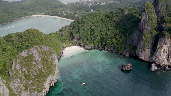 Rising Up Drone Shot From the Paradise Beach Coast Over Mountains