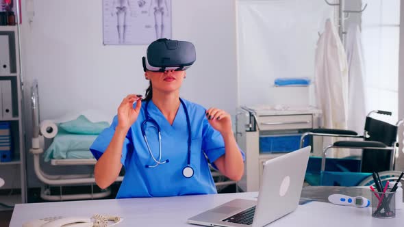 Healthcare Physician Experiencing Virtual Reality Using Vr Goggles