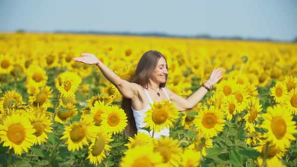 Girl in Sunflower Flowers