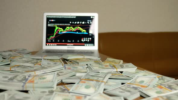 Lots of Money and Computer alt