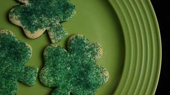 Cinematic, Rotating Shot of Saint Patty's Day Cookies on a Plate 