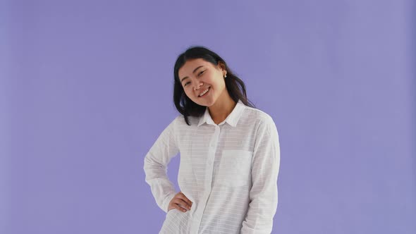 Gorgeous Asian Female in White Shirt