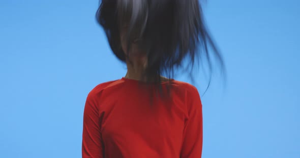 Young Woman Shaking Hair