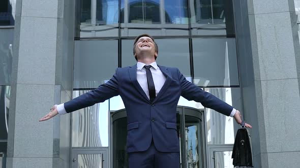 Confident Smiling Company Worker Enjoying Work Achievement, Success Celebration