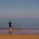 Man In Wetsuit And Sea - VideoHive Item for Sale