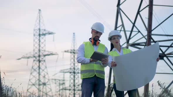 Working People at an Electricity Transmission Line, Close Up